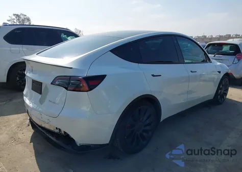 2022 Tesla Model Y из США, поврежденный, VIN 7SAYGDEF4NF555239